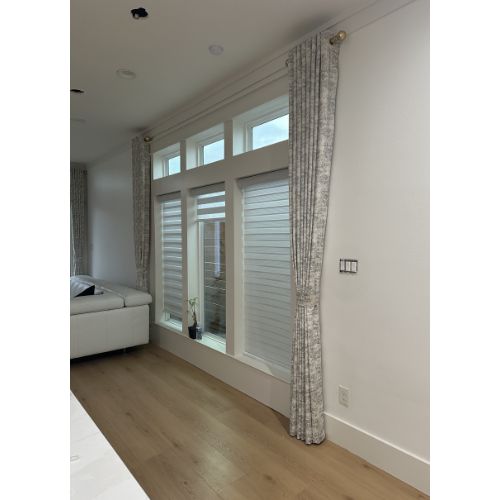 Dining Decorative white drapes with silver threading and 3 zebra shades